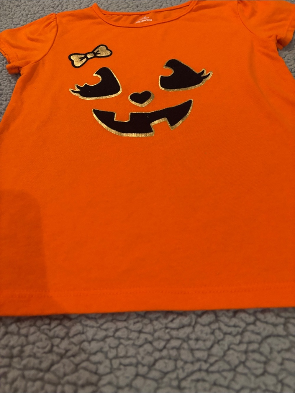 Celebrate Halloween Orange Pumpkin Face Tee with Black and Gold Accents